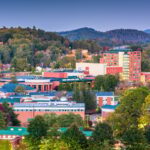 Boone, NC townscape surrounded by lush vegetation