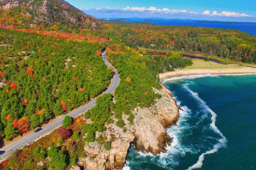 Lush forestry and blue water coastline of Acadia National Park