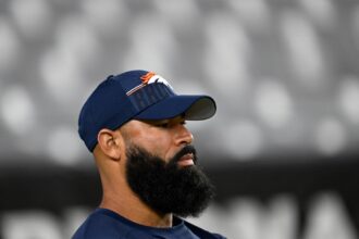 Ex-Broncos coach Michael Wilhoite's felony assault case dropped