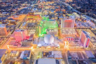 Aerial view of neon-lit Reno cityscape
