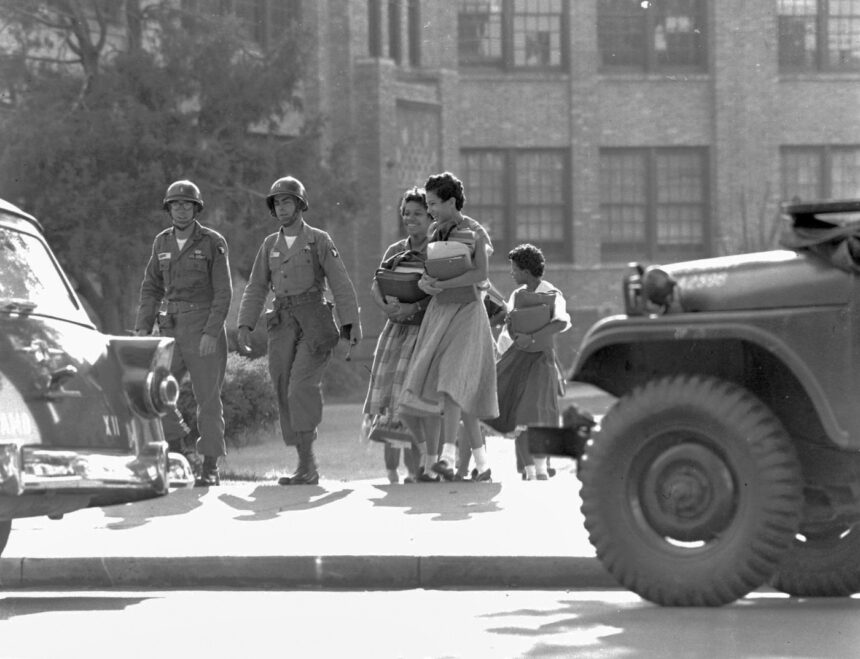 September 25, Military escorts Little Rock Nine into Central High