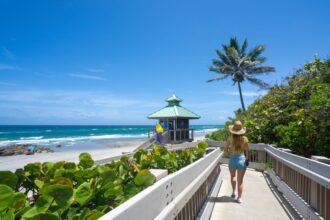 Woman on beachside boardwalk in Boca Raton