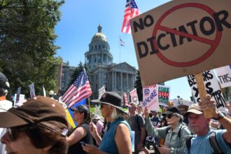 Thousands march in Denver in support of the working class and against Trump administration policies