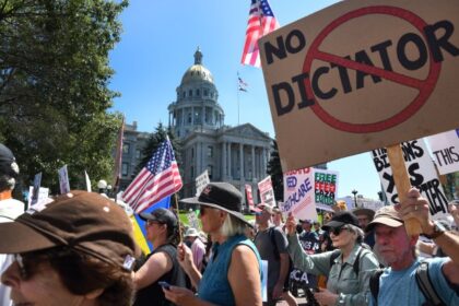 Thousands march in Denver in support of the working class and against Trump administration policies