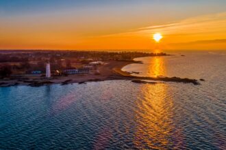 5 mile point lighthouse at sunset in New Haven, CT