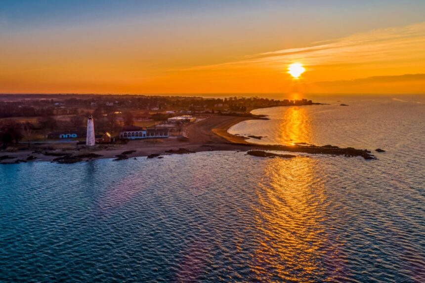5 mile point lighthouse at sunset in New Haven, CT