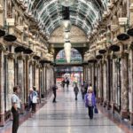 People visiting shops of Victoria Quarter in Leeds, UK
