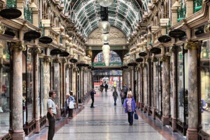 People visiting shops of Victoria Quarter in Leeds, UK
