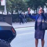 'Polka-Dot Dress Lady' Emerges As NYC's Anti-ICE Folk Hero