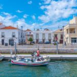 Boats on canal in Tavira, Portugal