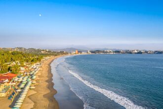 Miramar Beach, in Manzanillo, Colima, is a long stretch of golden sand with medium waves, ideal for swimming and surfing. Popular with both tourists and locals.