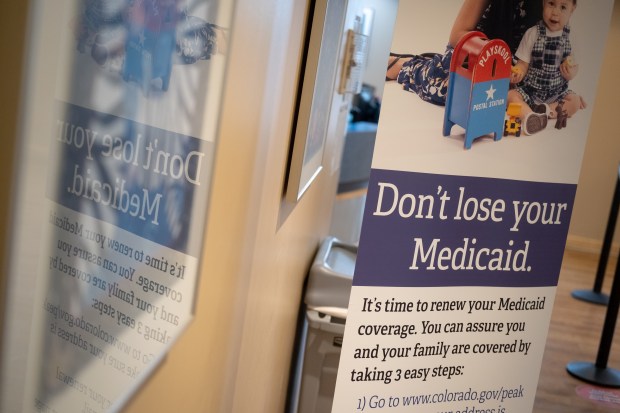 Polis wants to rein in Medicaid spending, privative Pinnacol in budget