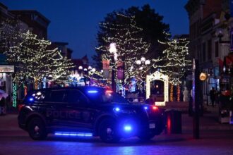Boulder Jewish community lights Menorah on site of Pearl Street attack