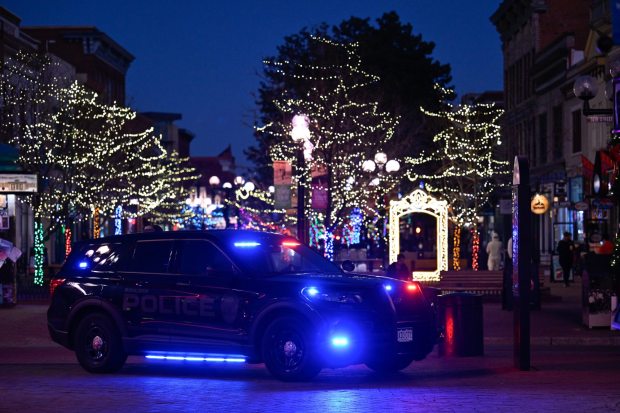 Boulder Jewish community lights Menorah on site of Pearl Street attack