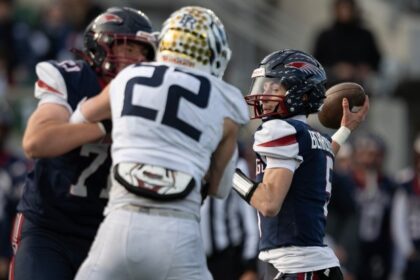 Dakota Ridge climbs final mountain with coach, quarterback leading way to title