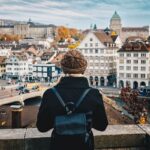 A Young Woman Admiring A View Of Zurich, Switzerland