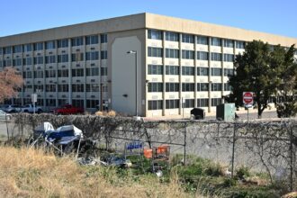 Denver opens large cold weather shelter despite squabble with council