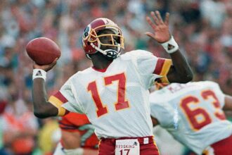 January 31, first Black quarterback plays and wins the Super Bowl