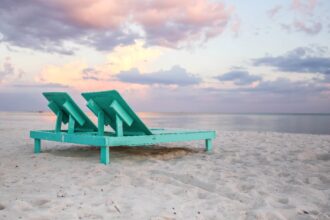 Teal loungers on Biloxi Beach in Mississippi
