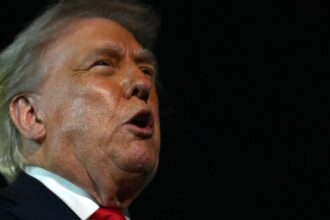 Trump Jabs U.S. Allies Over Greenland Ahead Of Davos Summit, ICE Minnesota Crackdown Continues: Live Updates