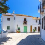 Whitewashed Old Town street in Altea, Spain