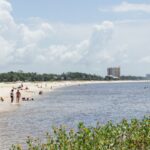 Beachgoers at Ken Combs Pier in Gulfport, MS