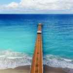 Pier and lifeguard stand at Juno Beach, Florida USA