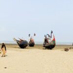 Woman in traditional garb on Bangladesh beach