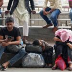 Stranded travelers scramble to make new connections as war shuts much of Middle East to air travel