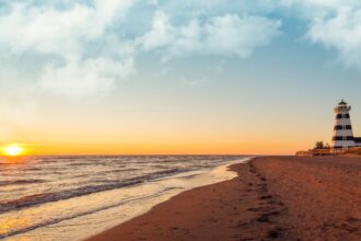 Lighthouse on beach in Prince Edward Island
