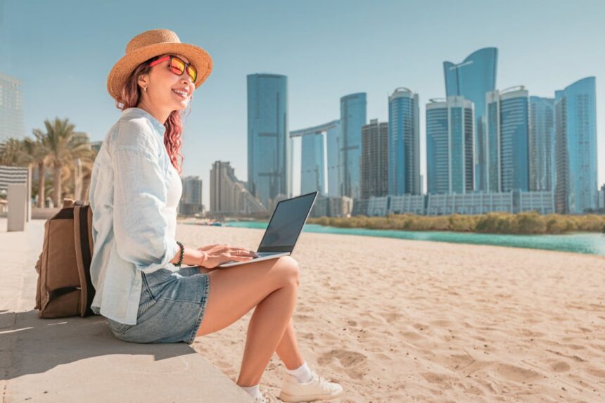 Digital nomad with laptop in Abu Dhabi