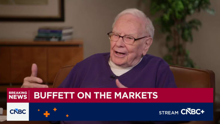 Warren Buffett says he sold Apple too soon and would buy more of it, though not in this market