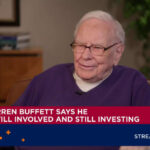 Warren Buffett says he's still making investment calls at Berkshire, flags 'tiny' buy