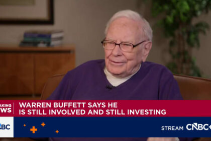 Warren Buffett says he's still making investment calls at Berkshire, flags 'tiny' buy