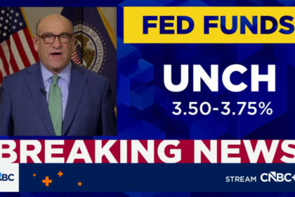 Fed holds rates steady amid dissent