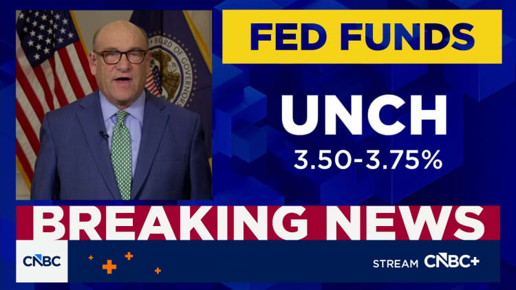 Fed holds rates steady amid dissent