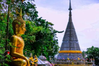 Golden Buddha and temple in Hat Yai, Thailand