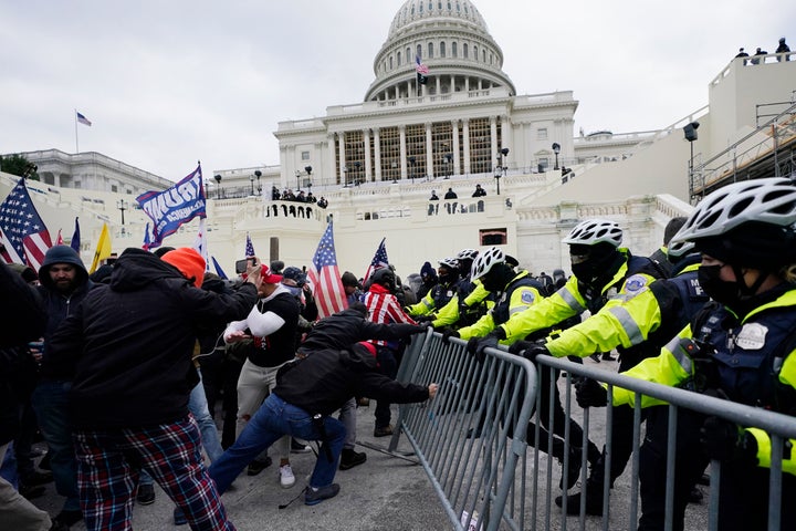 Trump's Justice Department Scrubs Its Website Of News Releases About Jan. 6 Defendants