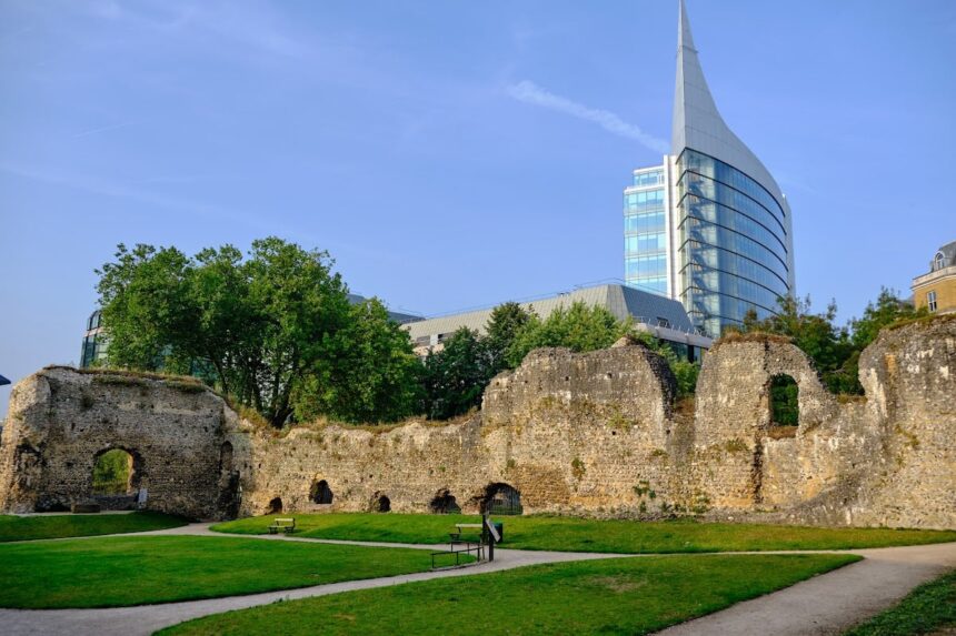Ruins of Reading, UK backdropped by modern high-rise